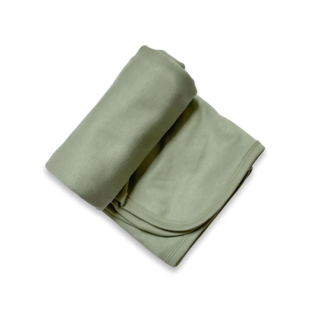 A Sage Baby Bamboo Swaddle Blanket by Little & Lively is shown folded, with one half rolled and the other laid flat on a white background—an ultra-soft baby essential made from soothing SootheKnit fabric.