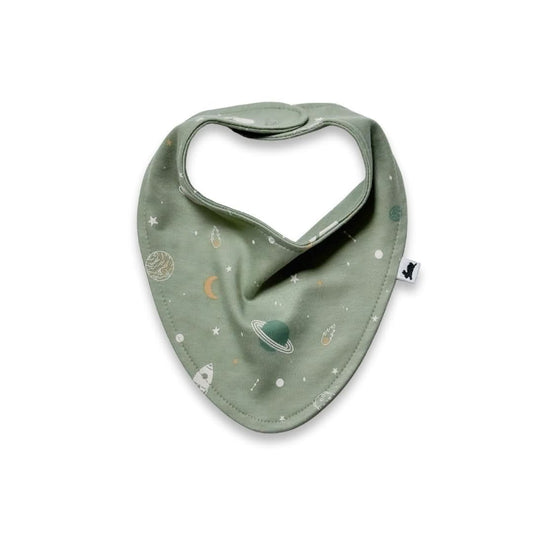 The Little & Lively Baby Bamboo Bib in Outer Space features adjustable snaps, a space-themed print of planets and rockets, soft bamboo fabric, and a small white tag on the right side.