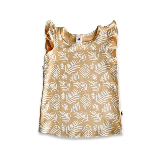 The Little & Lively Baby/Kids Bamboo Ruffle Shoulder is a girls' sleeveless top in light yellow with white leaf patterns and ruffle shoulder details, shown on a white background.
