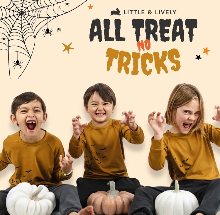 Little & Lively, All Treat No Tricks. Three kids in mustard bat pullovers making monster faces behind pumpkins.